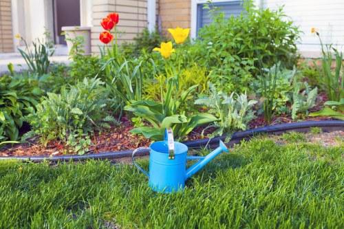 Team handling garden materials safely during routine work